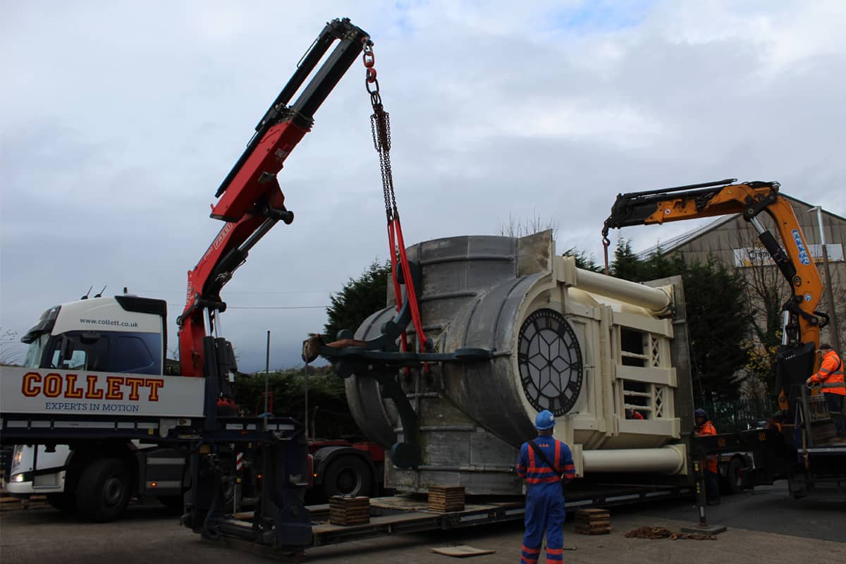 Collett Crane Vehicles Relocating the Cooperative Clock